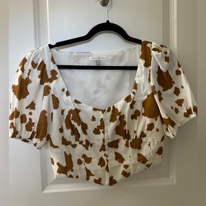 Backyard Roses Bailey Cow Print hook top
